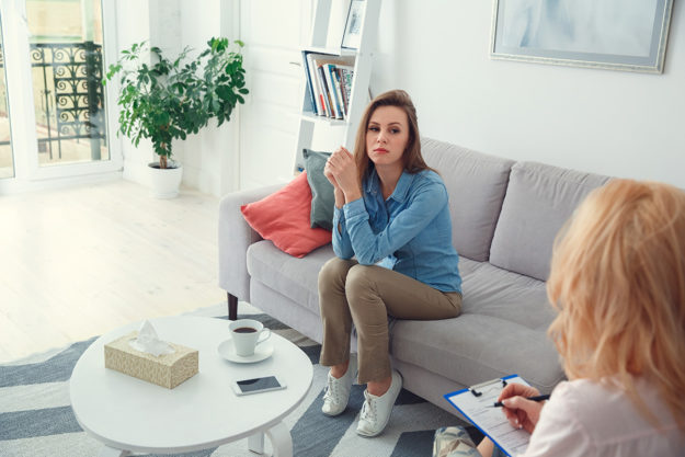 mental health treatment a woman asks her therapist do i need mental health treatment