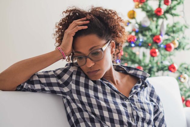 woman struggling with her mental health and holidays